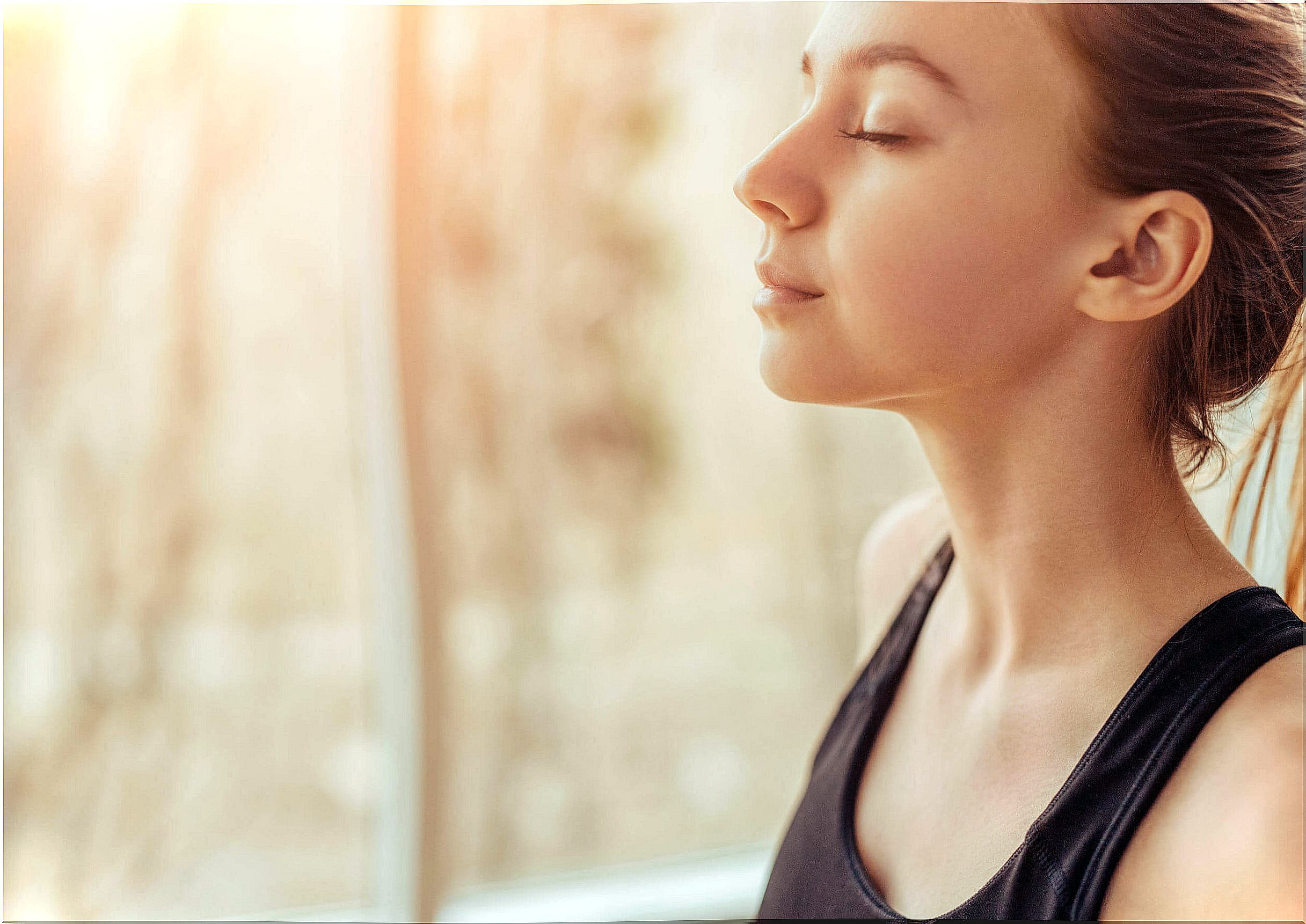 Breathing before exercising can ease back pain.