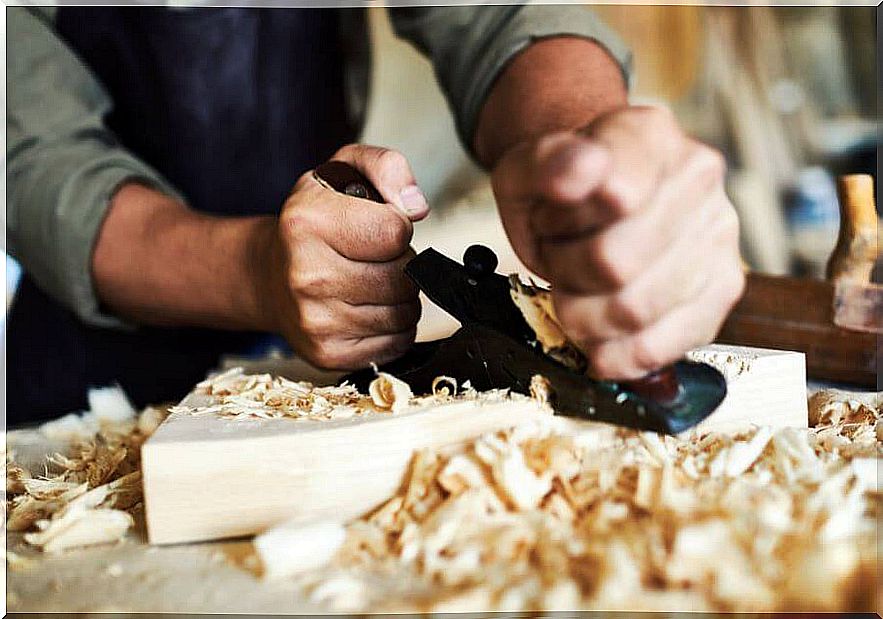 Man polishing wood