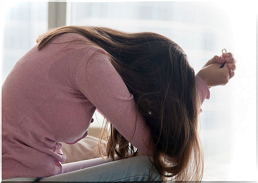 Crying woman with depression.