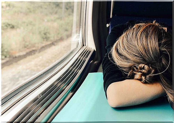 Woman reluctantly on the train